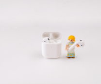 Air Pods dans leur boîtier de charge